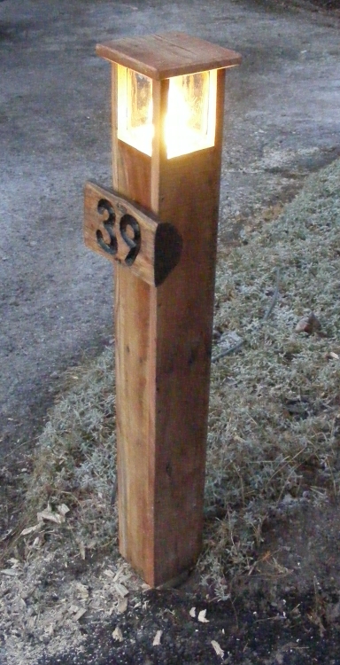 Make a garden 'bollard' driveway light out of pallet wood and a glass jar